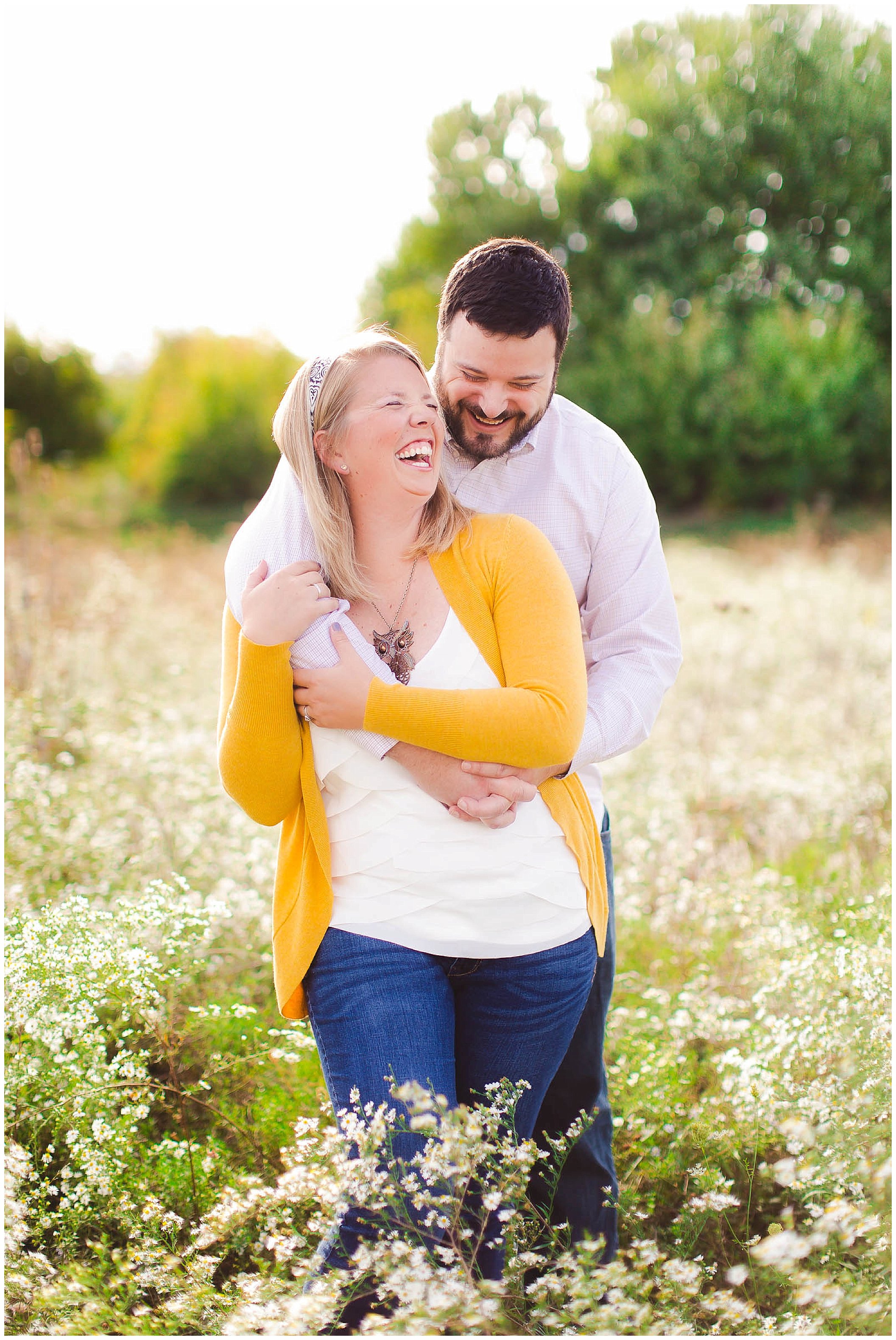 Sunshine filled engagement session in a field of wildflowers, Fort Wayne Indiana Wedding Photographer_0002.jpg