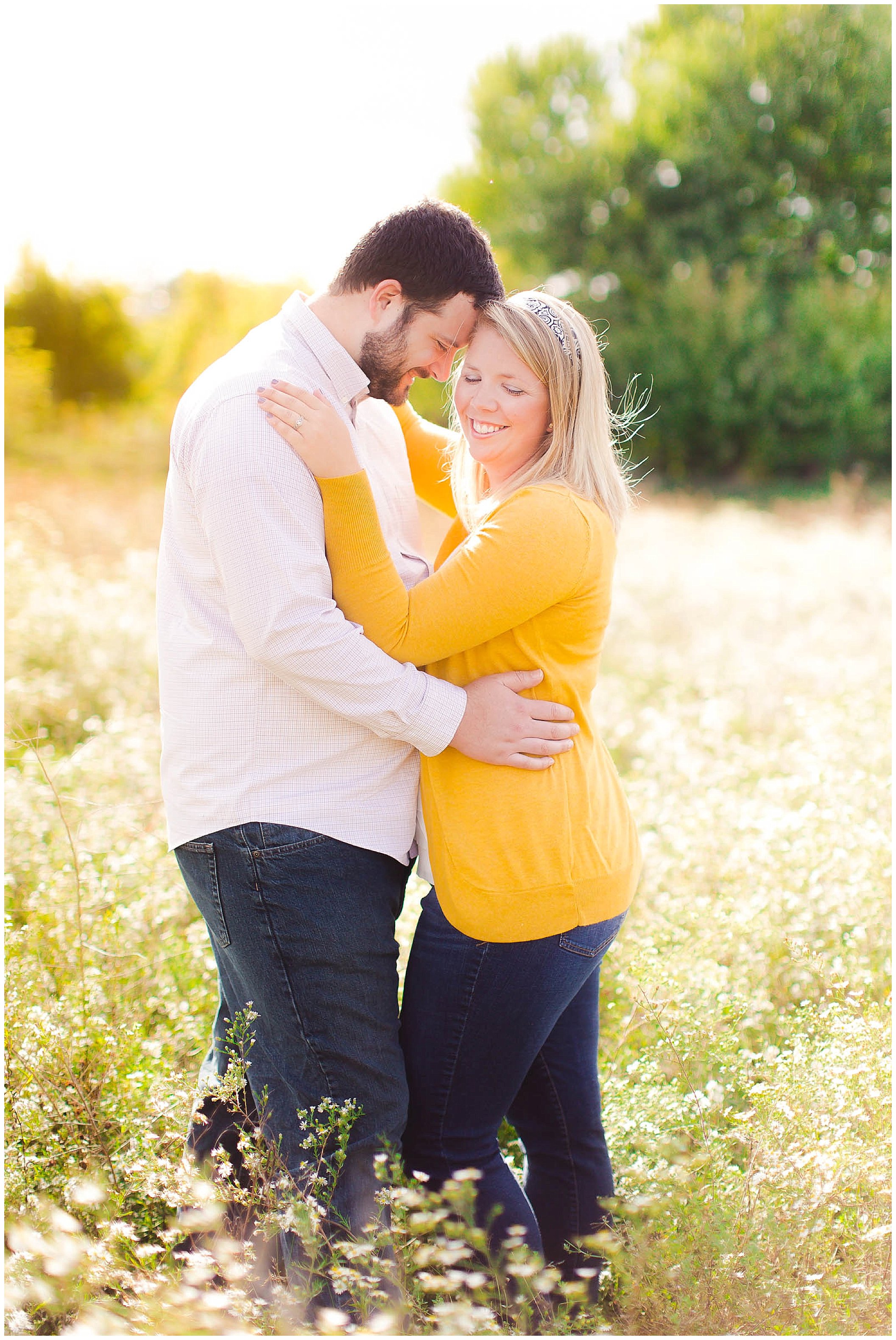 Sunshine filled engagement session in a field of wildflowers, Fort Wayne Indiana Wedding Photographer_0003.jpg