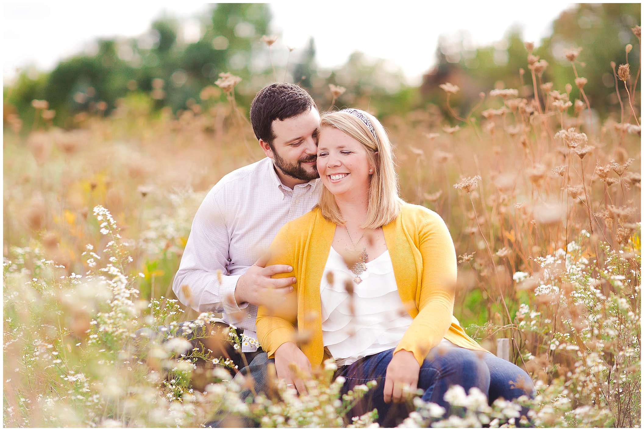 Sunshine filled engagement session in a field of wildflowers, Fort Wayne Indiana Wedding Photographer_0004.jpg