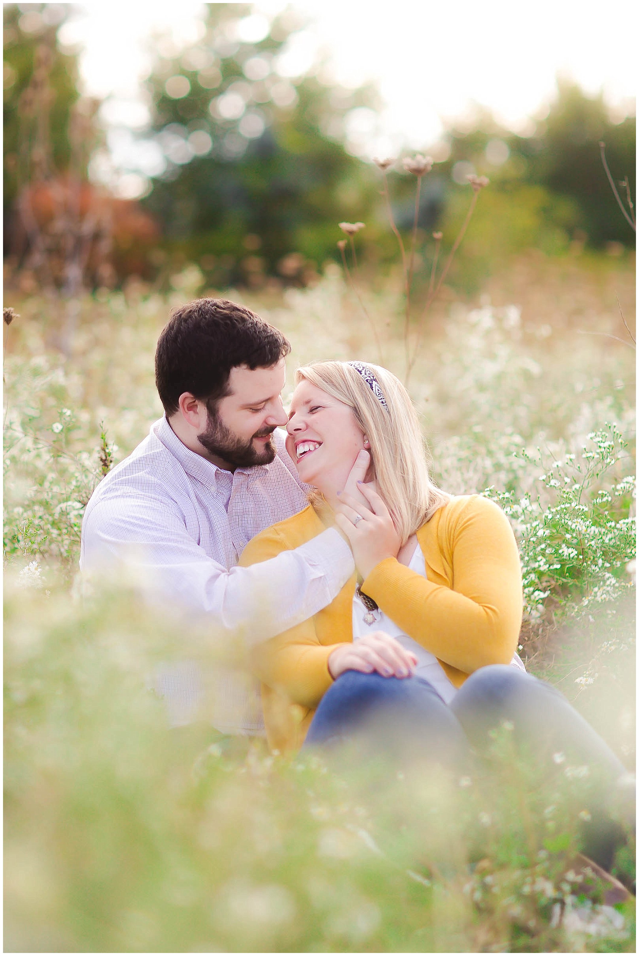 Sunshine filled engagement session in a field of wildflowers, Fort Wayne Indiana Wedding Photographer_0009.jpg