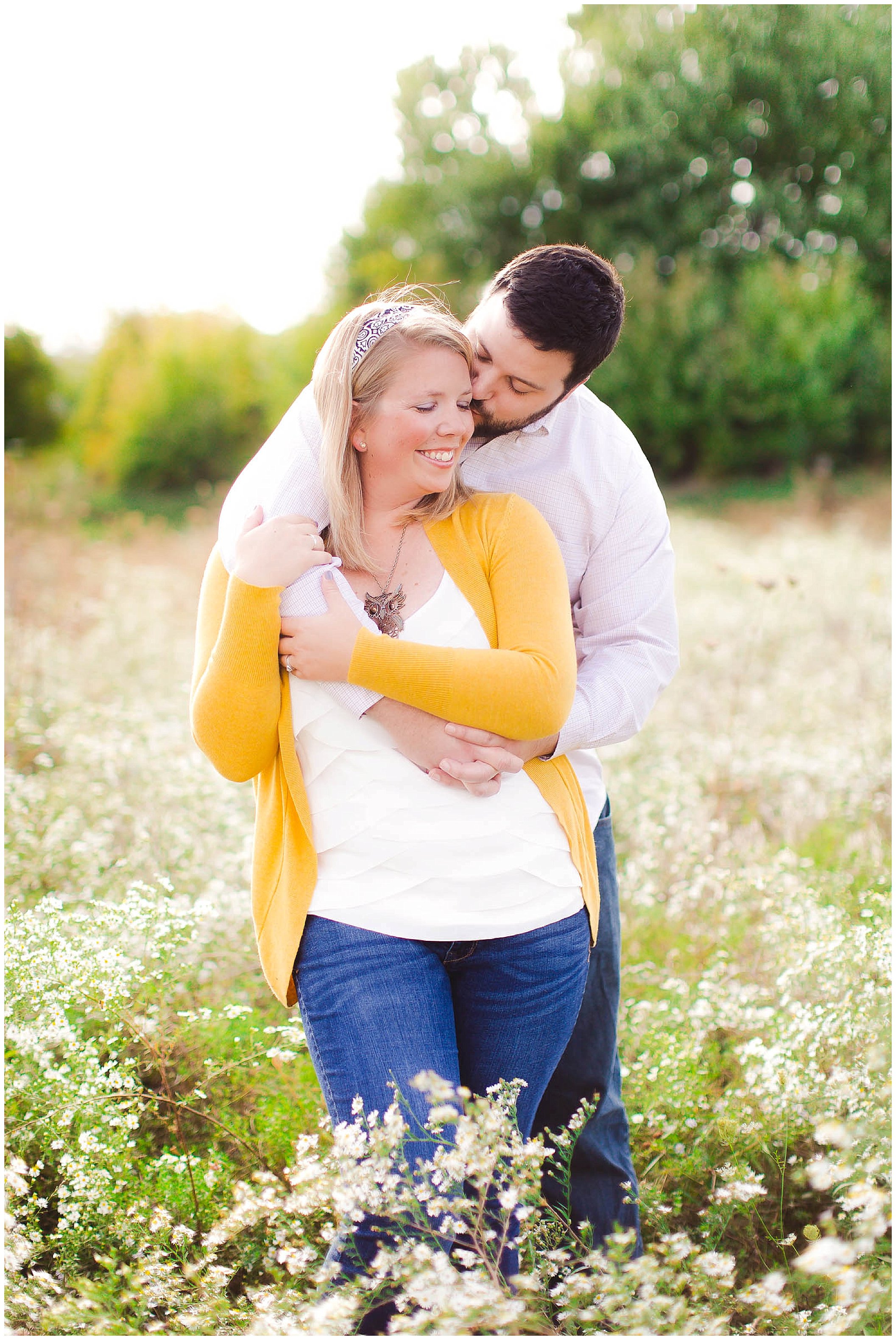 Sunshine filled engagement session in a field of wildflowers, Fort Wayne Indiana Wedding Photographer_0013.jpg