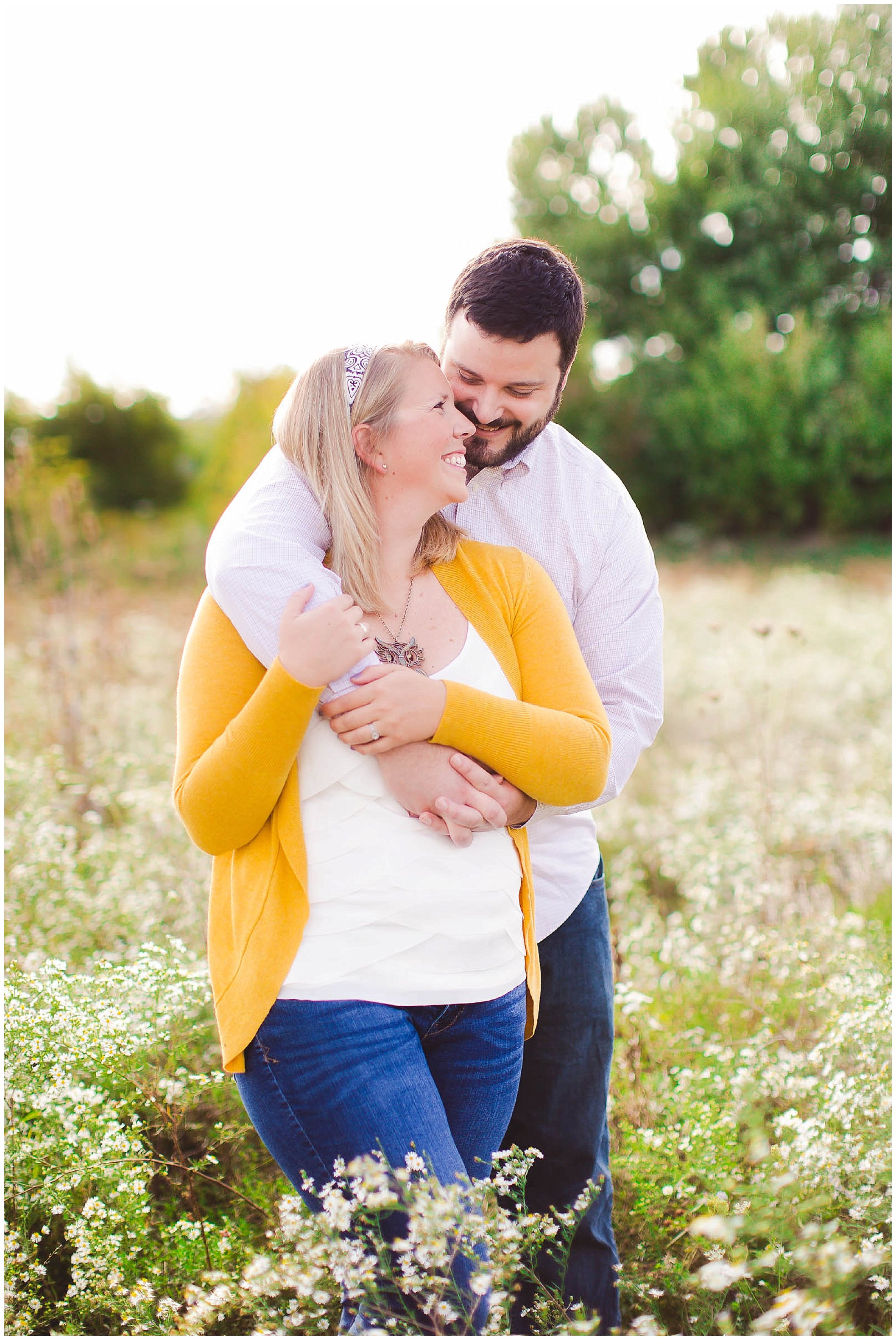 Sunshine filled engagement session in a field of wildflowers, Fort Wayne Indiana Wedding Photographer_0014.jpg