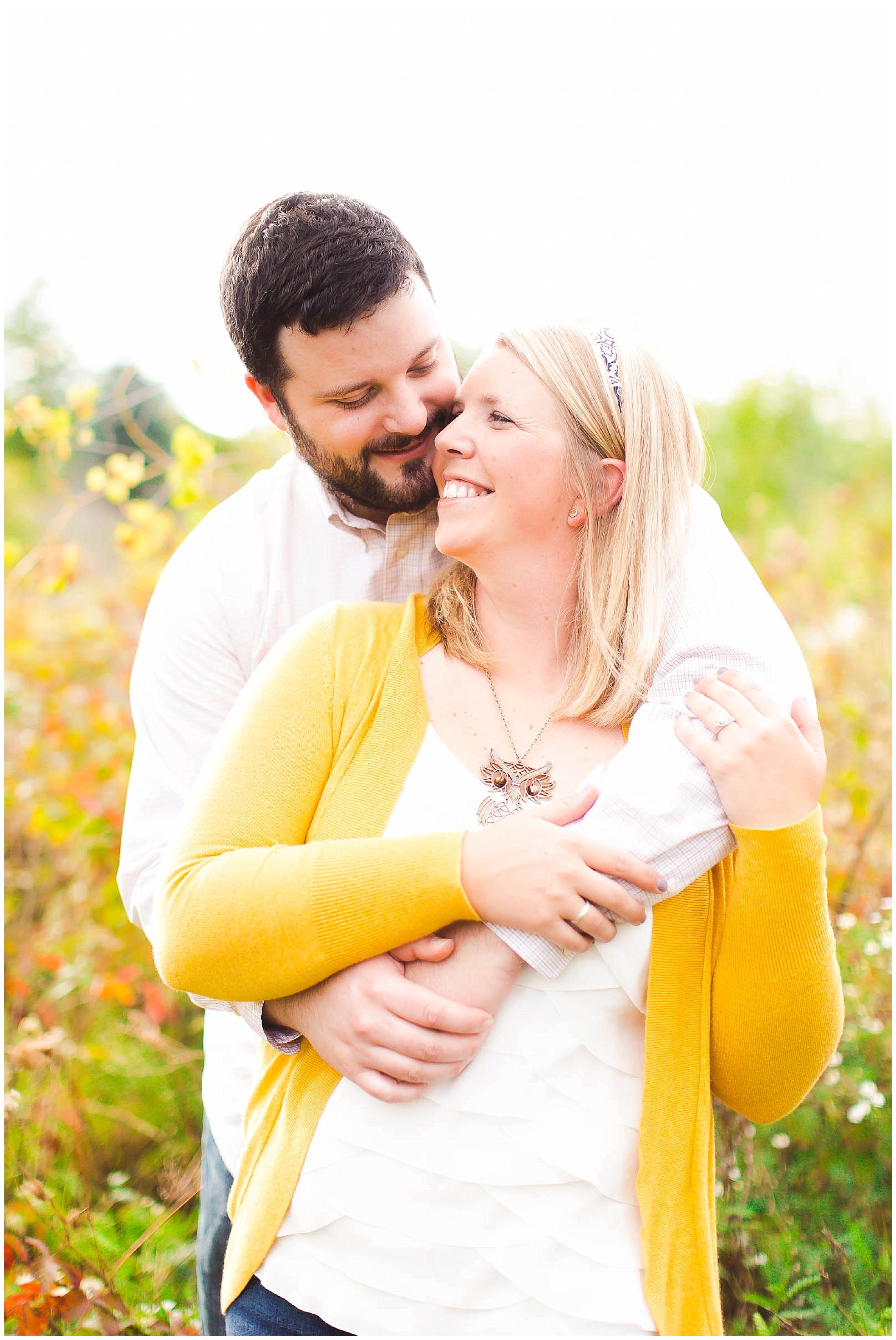 Sunshine filled engagement session in a field of wildflowers, Fort Wayne Indiana Wedding Photographer_0023.jpg