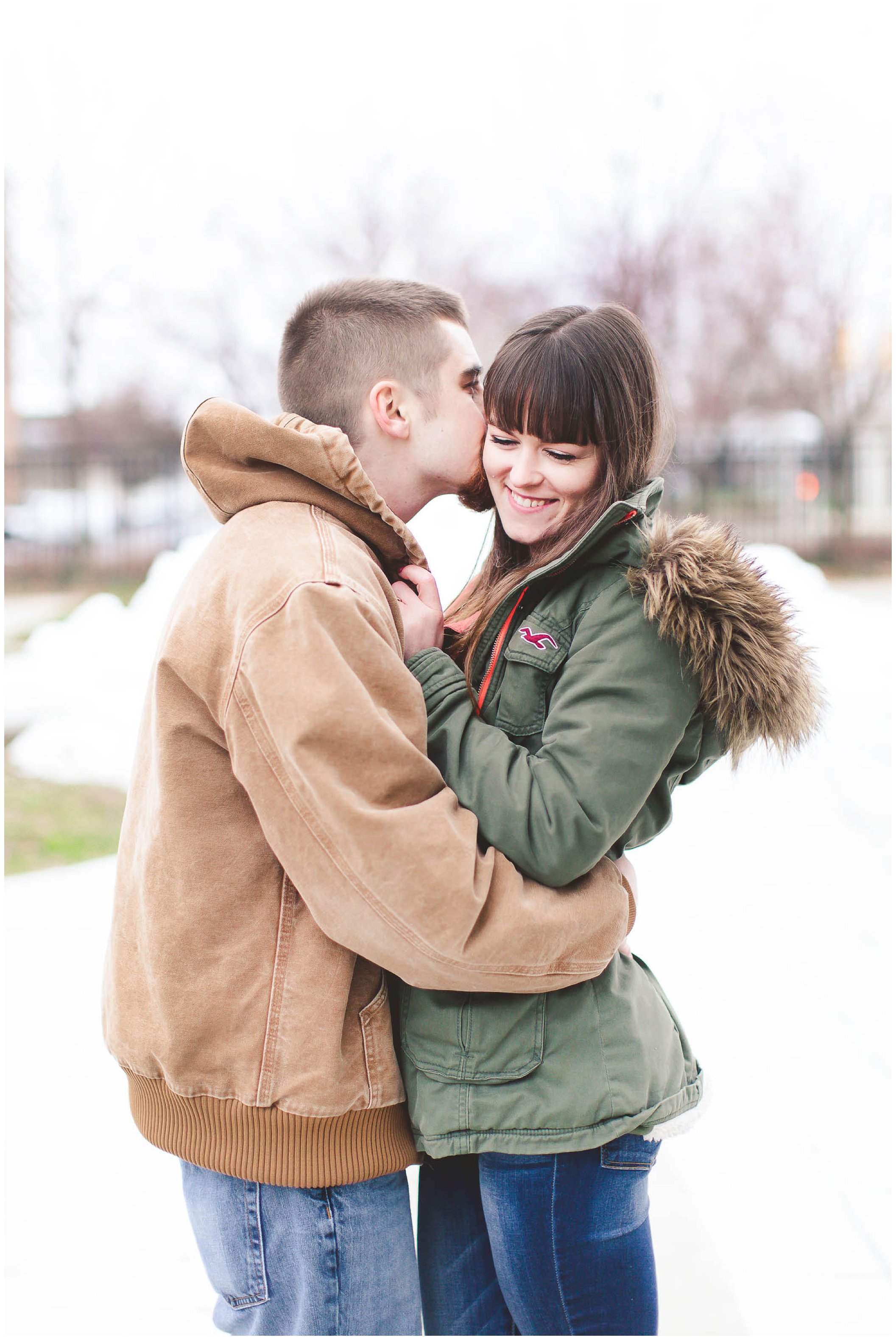 Adorable snowy engagement session at an ice rink while ice skating, Fort Wayne Wedding Photographer_0003.jpg