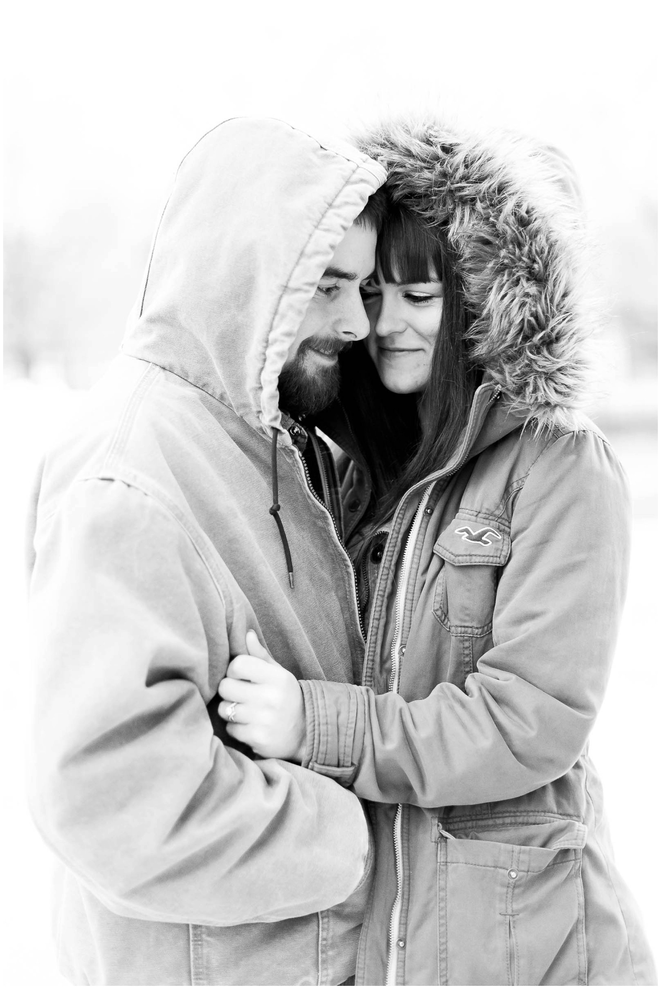 Adorable snowy engagement session at an ice rink while ice skating, Fort Wayne Wedding Photographer_0004.jpg