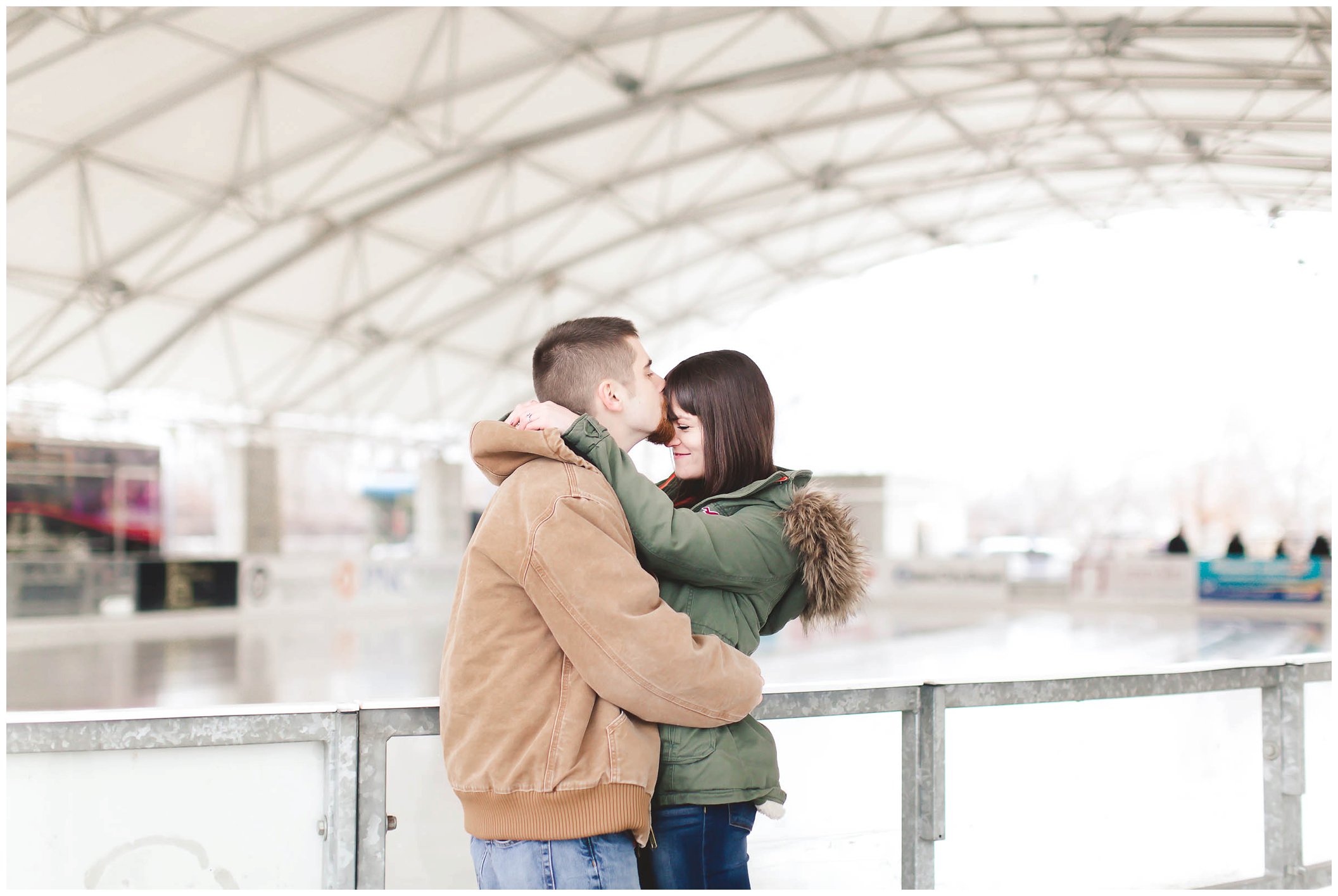 Adorable snowy engagement session at an ice rink while ice skating, Fort Wayne Wedding Photographer_0005.jpg