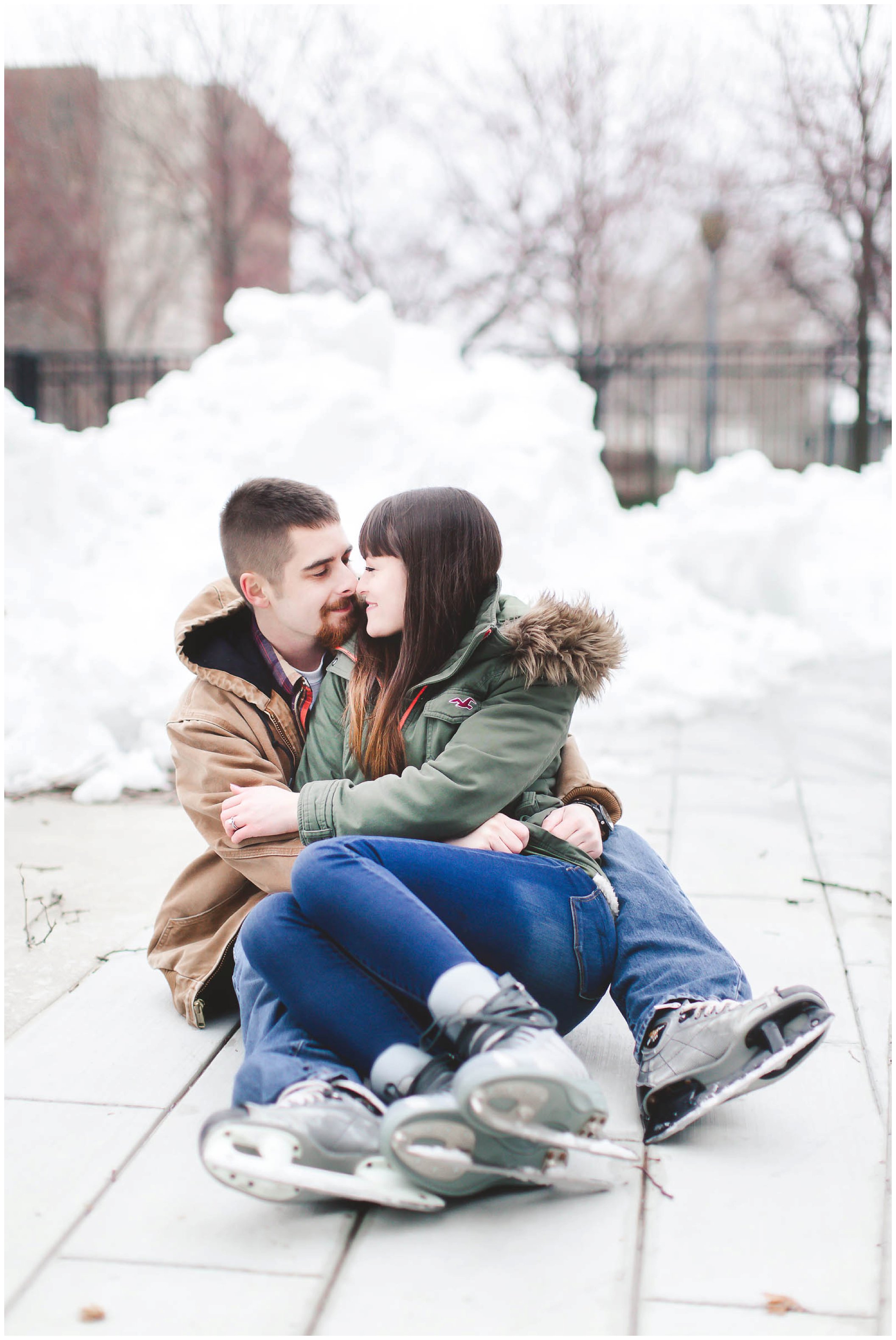 Adorable snowy engagement session at an ice rink while ice skating, Fort Wayne Wedding Photographer_0008.jpg