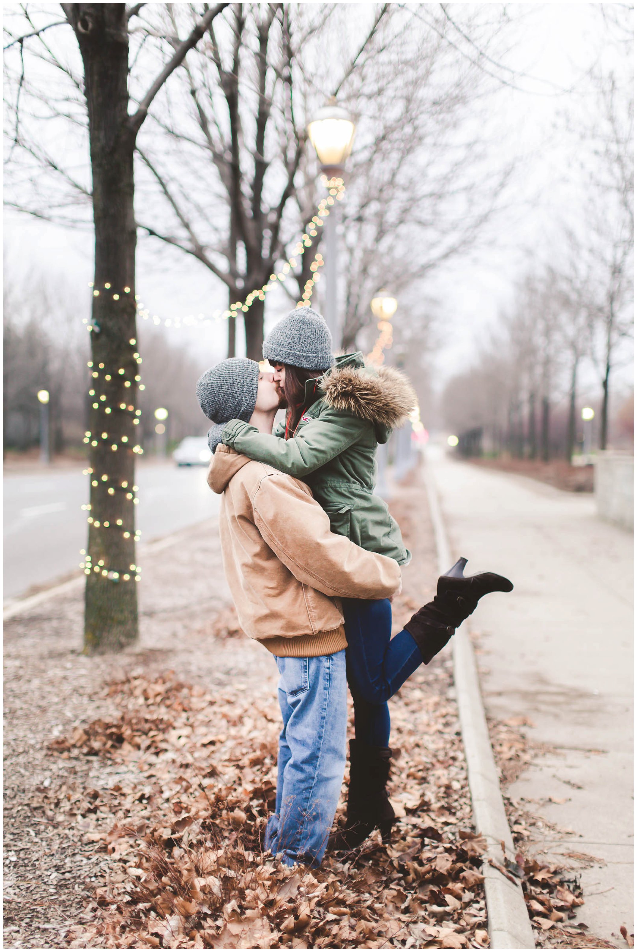 Adorable snowy engagement session at an ice rink while ice skating, Fort Wayne Wedding Photographer_0018.jpg