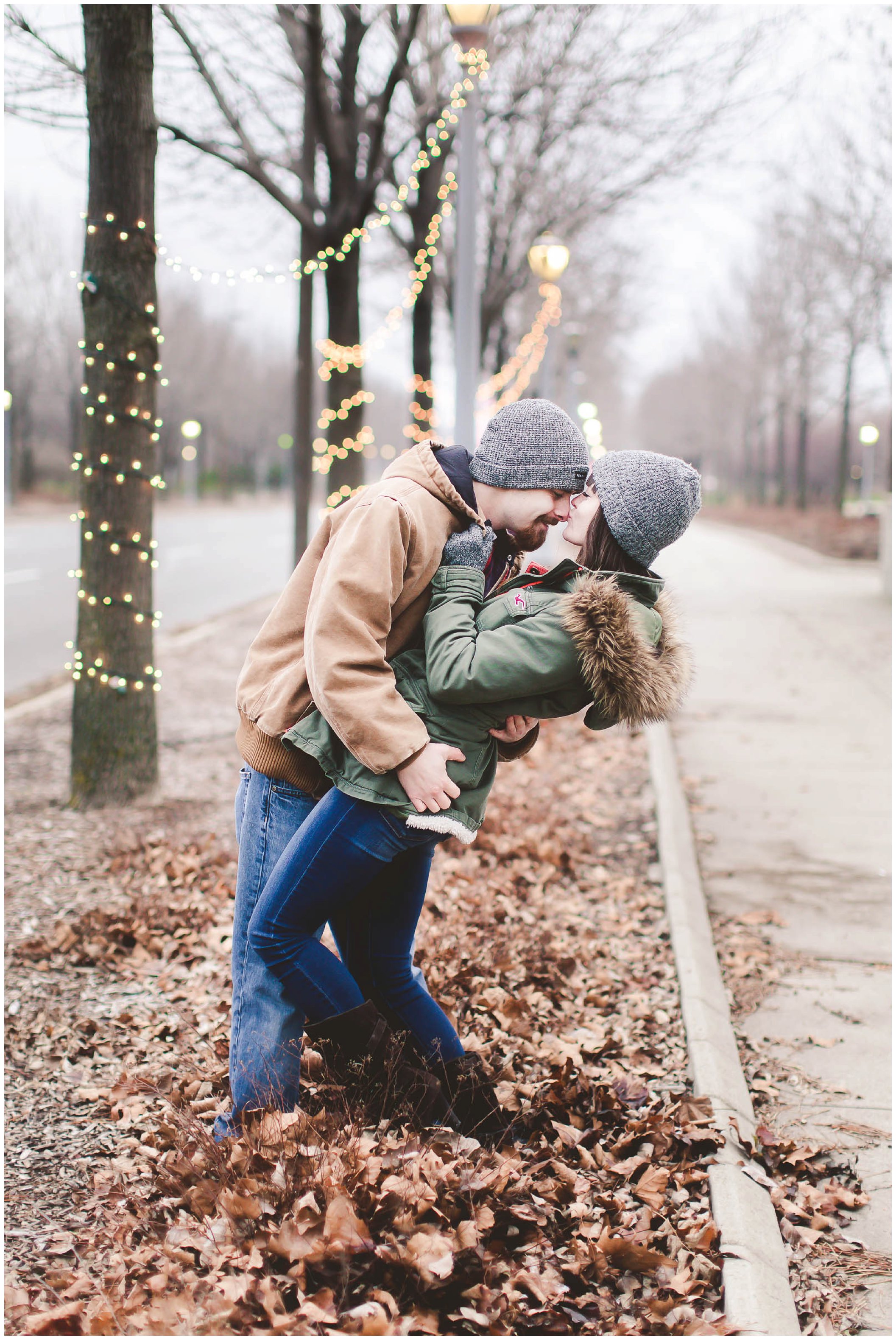 Adorable snowy engagement session at an ice rink while ice skating, Fort Wayne Wedding Photographer_0019.jpg