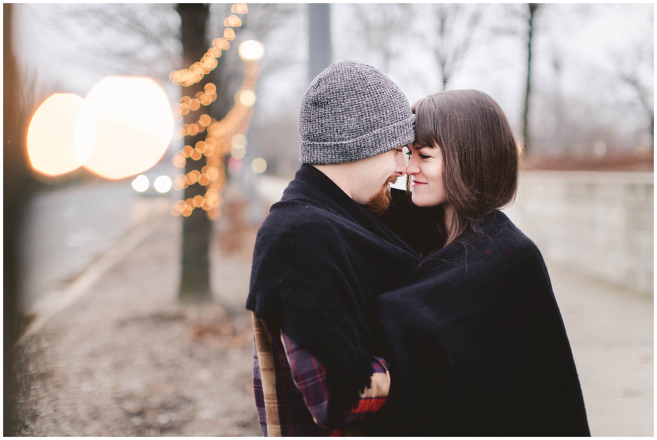Adorable snowy engagement session at an ice rink while ice skating, Fort Wayne Wedding Photographer_0022.jpg