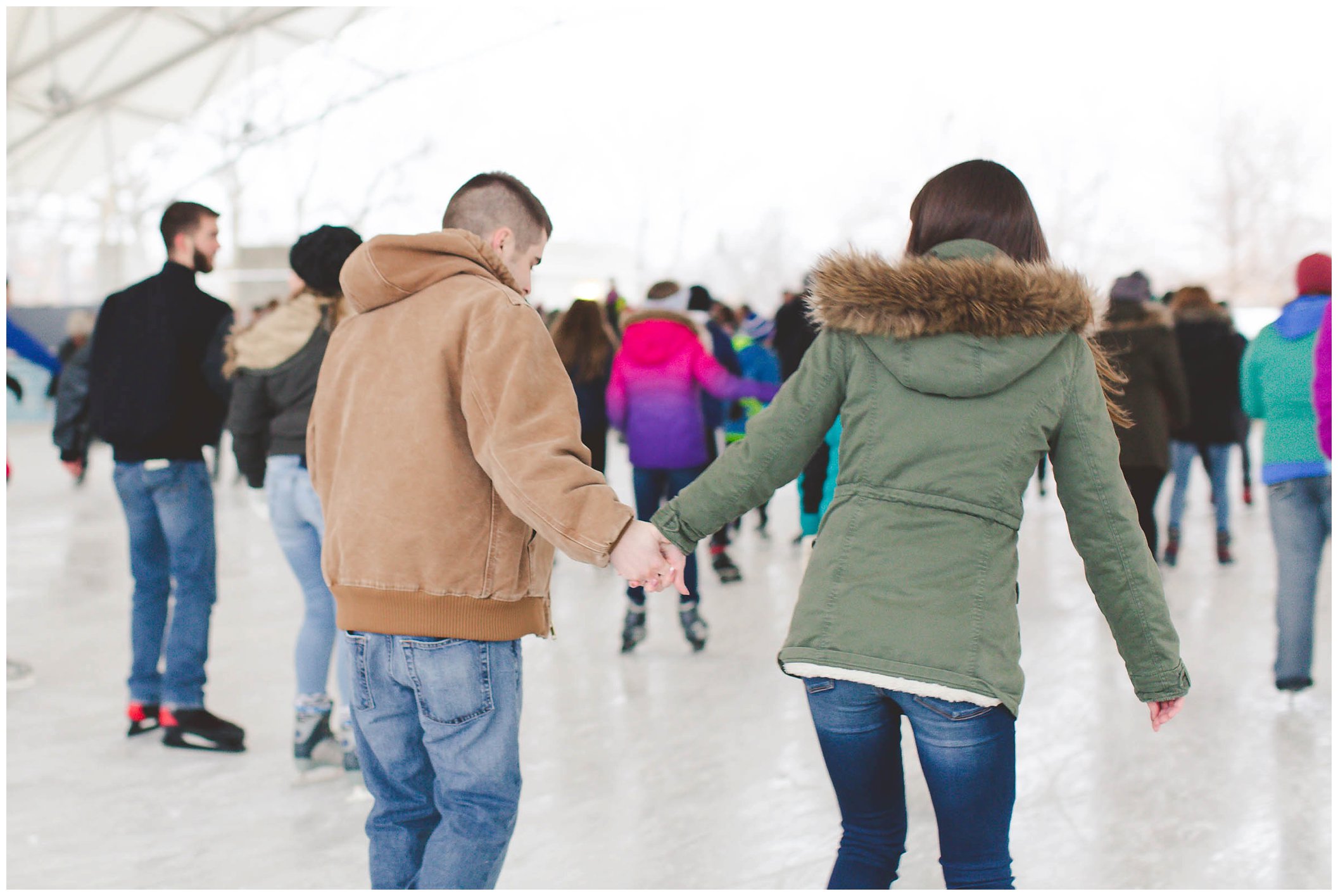 Adorable snowy engagement session at an ice rink while ice skating, Fort Wayne Wedding Photographer_0031.jpg