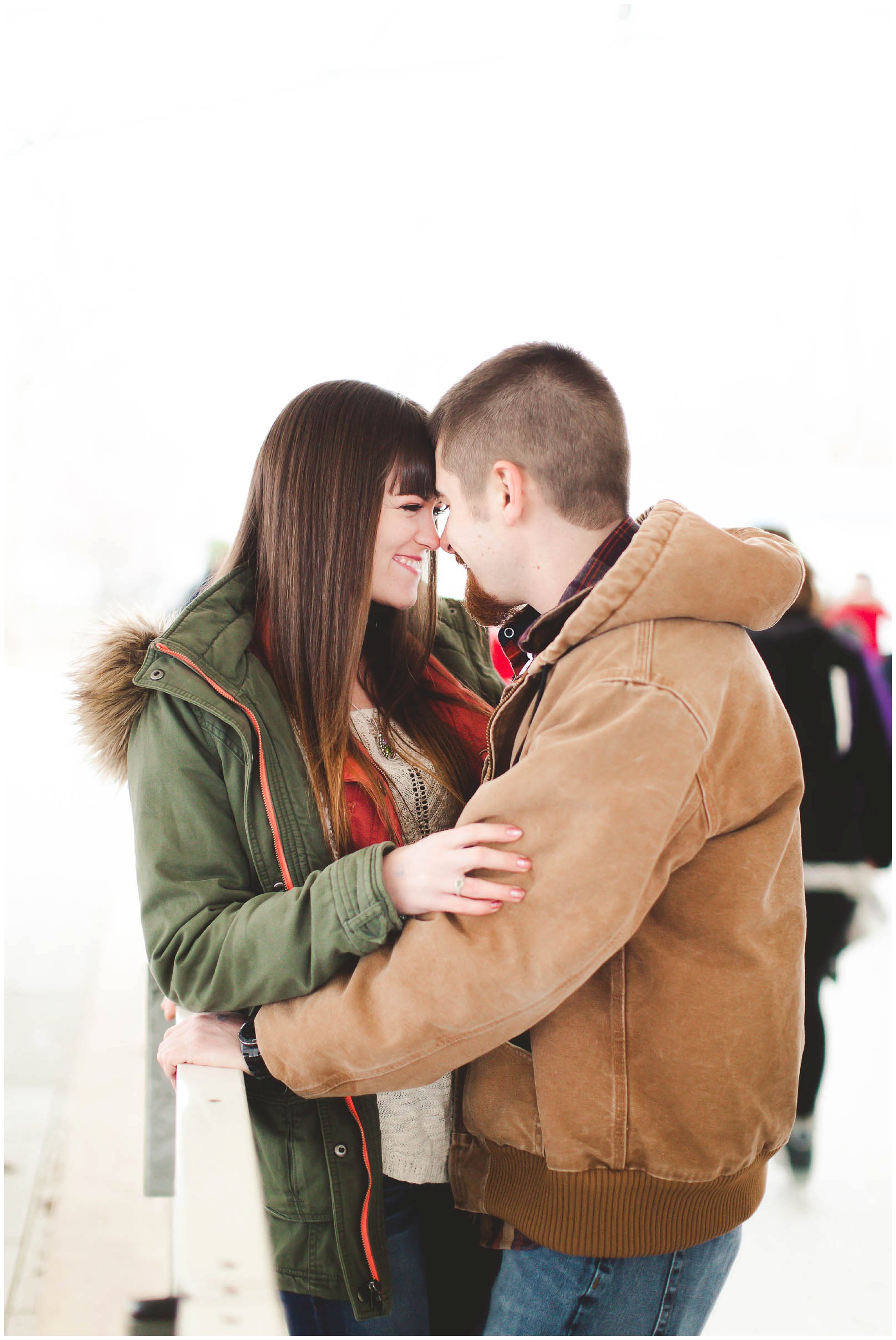 Adorable snowy engagement session at an ice rink while ice skating, Fort Wayne Wedding Photographer_0033.jpg