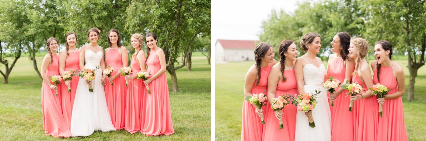 Bridesmaids close smiling and laughing with each other at a wedding outside